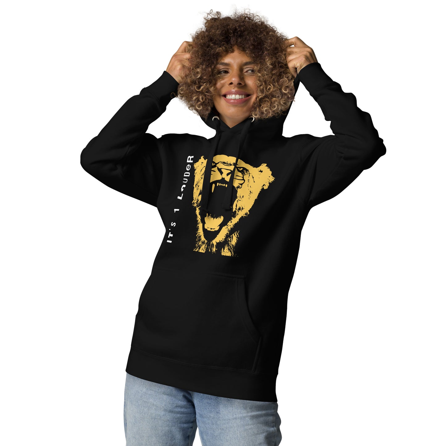 Smiling model pulling up the hood of the black Rock and Roar hoodie with gold big cat print
