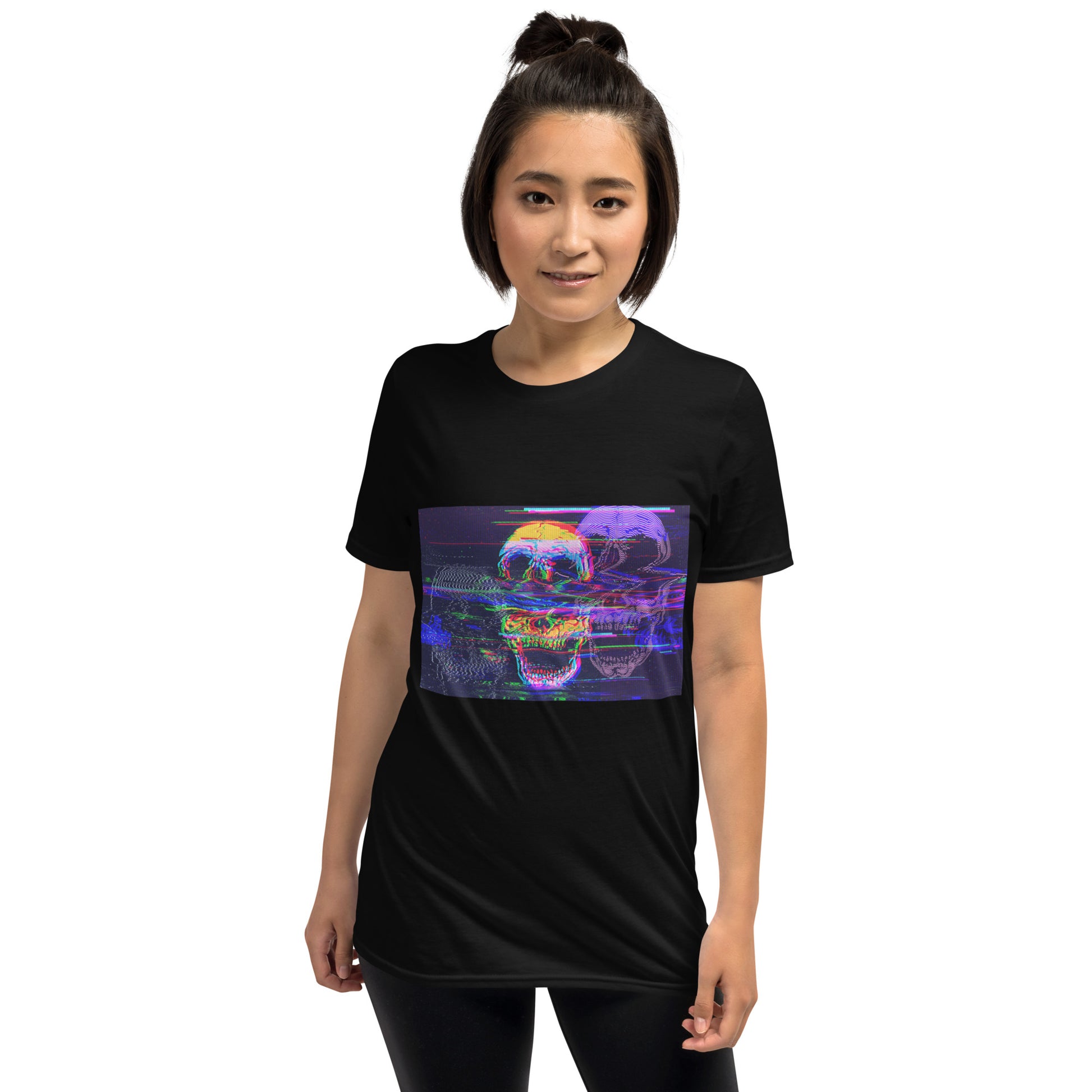 Person wearing a black t-shirt with a colorful skull face design on a white background
