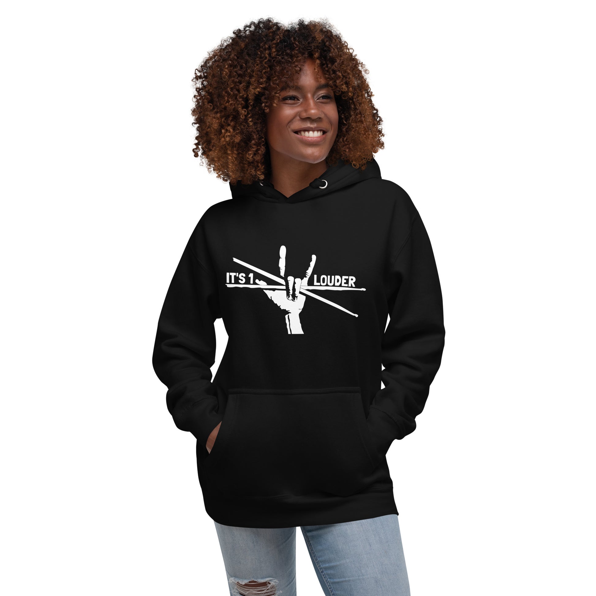 Smiling model wearing the black Drumsticks hoodie with white drumsticks print and hands in pocket