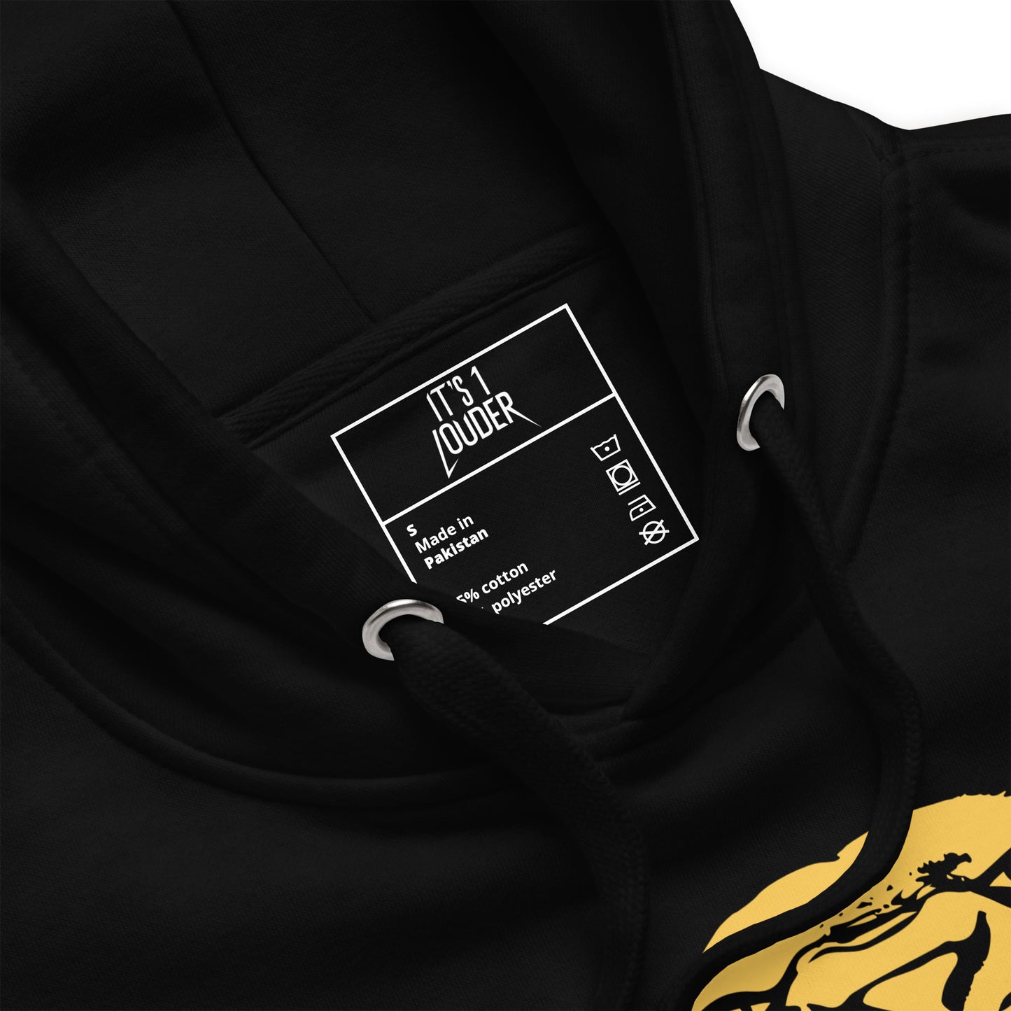 Close-up of the It's 1 Louder neck label inside the black hoodie with gold print detail