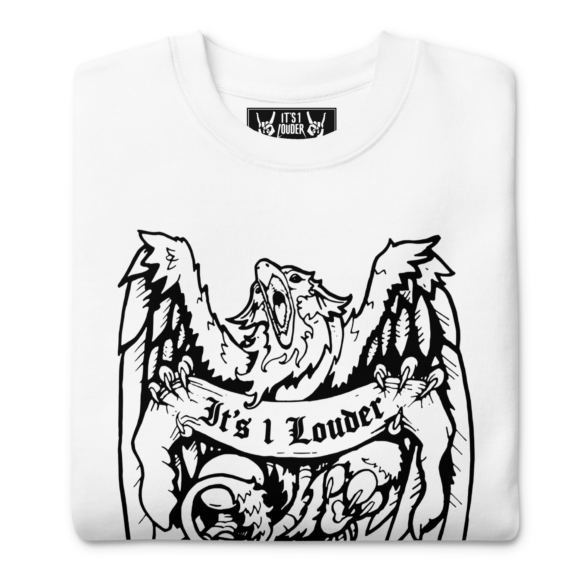 A white sweater with an image of a griffin which is a half-eagle half lion beast. The griffin has its wings spread wide and beak fully open. The entire graphic is in black. This sweater definitely gives off a rockstar or rock style look. Image is a close up of the front where you see most of the griffin design and part of the inside label. Inside label also says IT'S 1 LOUDER and 2 hands doing the rock and roll sign.